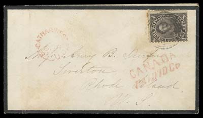 CANADA  1859 (October 17) Small mourning cover from St. Catharines, U.C. to Rhode Island, USA, bearing a fine centered 10c black brown perf 11¾, faint perf toning, tied by light four-ring 