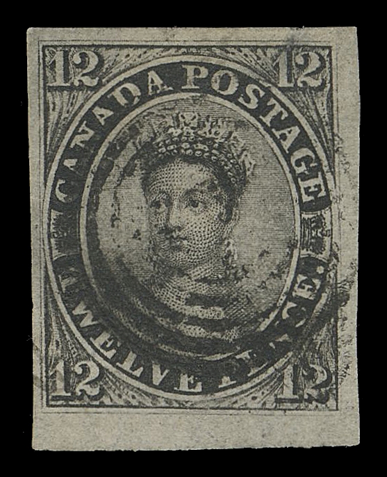 CANADA -  2 PENCE  3,A superb margined used single of this world renowned classic  stamp, displaying uncharacteristically large margins all around  including portion of sheet margin at foot, exceptional colour,  clear impression and prominent vertical laid lines; small thin at upper right, extremely fine appearance with  ideal concentric rings cancellation, centrally struck and mostly  clear of the Queen
