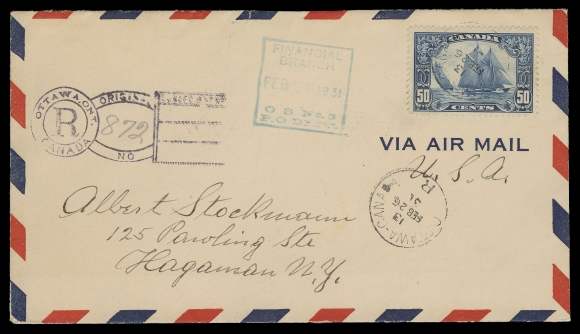 CANADA -  8 KING GEORGE V  1931 (February 26) Airmail envelope bearing a 50c Bluenose tied by Ottawa "R" registered CDS, second strike shown below, "key-hole" registration handstamp at left, boxed Post Office Department, Financial Branch datestamp in blue, to Hagaman, USA with Montreal transit and US arrival backstamp; overfranked yet appealing and a scarce single-franking, F-VF (Unitrade 158)