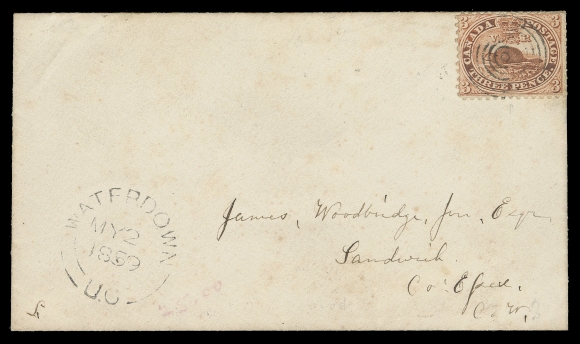 CANADA -  2 PENCE  1859 (May 2) Envelope bearing 3p brown red, perf 11¾, one shorter perf top right, concentric rings cancel, Waterdown, U.C. double arc dispatch at left, three different backstamps with Hamilton MY 2 and Windsor MY 3 transits and Sandwich MY 5 receiver, F-VF; 2004 Greene Foundation cert. (Unitrade 12)