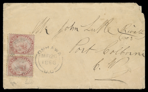 HALF PENNY AND ONE CENT  1866 (March 26) Cover franked with horizontal pair of 1c rose, perf 12, light soiling and perf toning, tied by light concentric rings with clear Oshawa double arc dispatch alongside, addressed to John Luke, Private, Port Colborne, C.W. at the Two cent Military Concessionary letter rate - in effect for active military personnel on duty as well as, and considerably scarcer on mail addressed to a Soldier. Very few letters to Soldiers have survived; understandably so as they were exposed to the elements for an long periods of time. Some edge wear at foot and roughly opened at right, perhaps adding to the overall "cachet" of this extremely rare "to a Soldier" concessionary rate cover, Fine appearance (Unitrade 14)Provenance: Vincent Graves Greene Collection (backstamped)Literature: This is cover No. 2 listed in "Canada