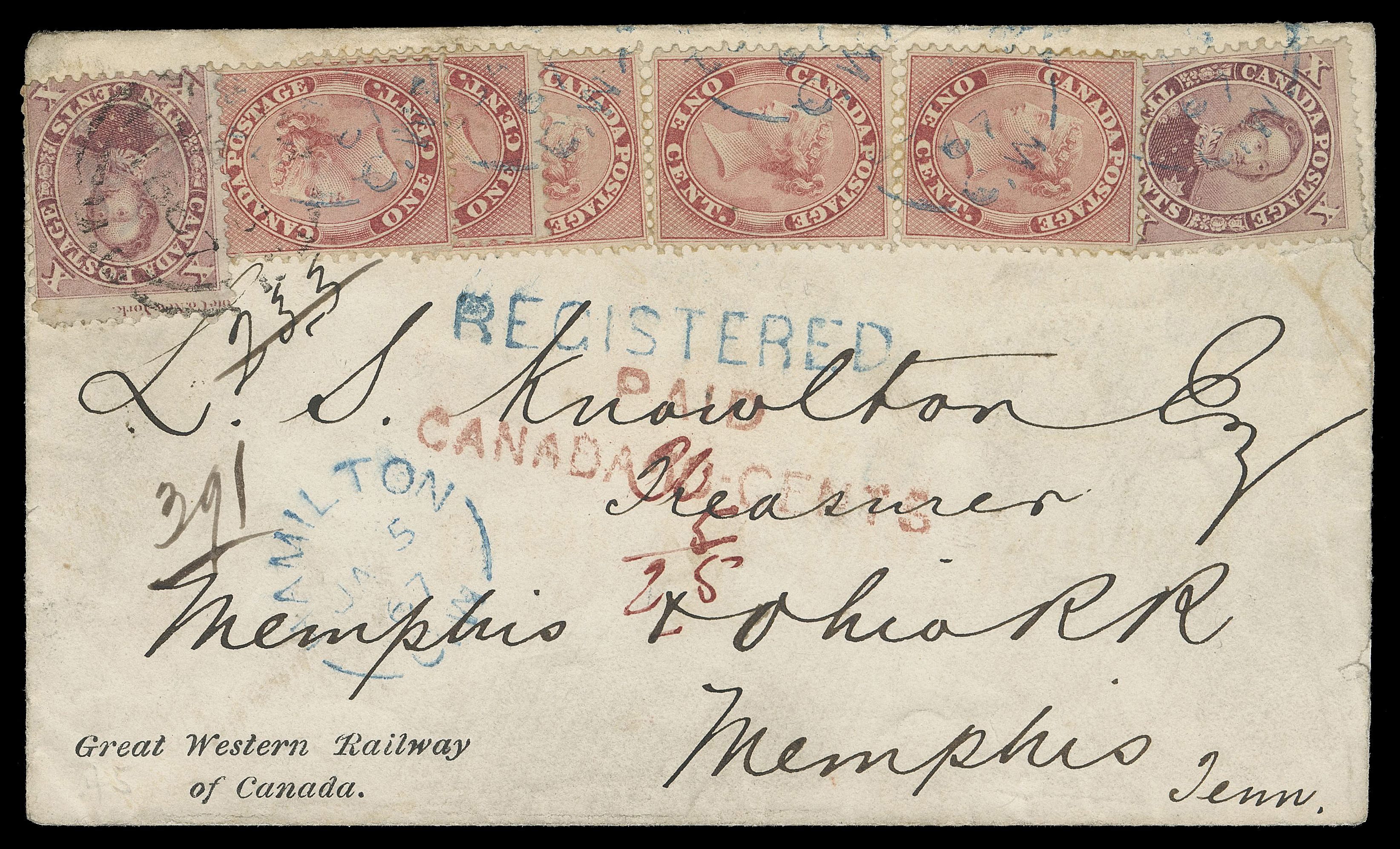 SIX PENCE AND TEN CENTS  1867 (January 5) Great Western Railway of Canada envelope sent registered from Hamilton to Memphis, Tennessee, displaying an outstanding franking with two 10c claret (PO 23), perf 12, left example showing portion of ABNC imprint and faint "String of Pearls" plate variety (Position 3) and five examples of the 1c rose, perf 12, three of which are overlapped, tied by Hamilton JA 5 double arc dispatch in black at top left and by Hamilton JA 5 67 split ring datestamps in blue, additional strike below with same-ink straightline REGISTERED, border exchange two-line PAID / CANADA 10 CENTS with "10" digit modified as "20" in manuscript, plus "5 / 25" below, light Windsor JA 7 transit backstamp; envelope with tears, one of which shows on the front near right 10c, couple stamps with minor perf flaws. An impressive double registered weight letter to the United States - A UNIQUE FRANKING to the US according to the Firby census, F-VF (Unitrade 14, 17, 17iv)

Census: This is cover No. 5 listed in Arfken & Leggett "Canada